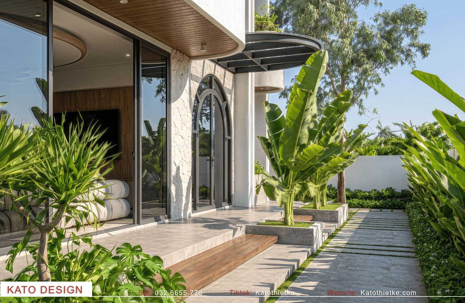 Lối đi lát đá uốn cong quanh khu vực sân vườn